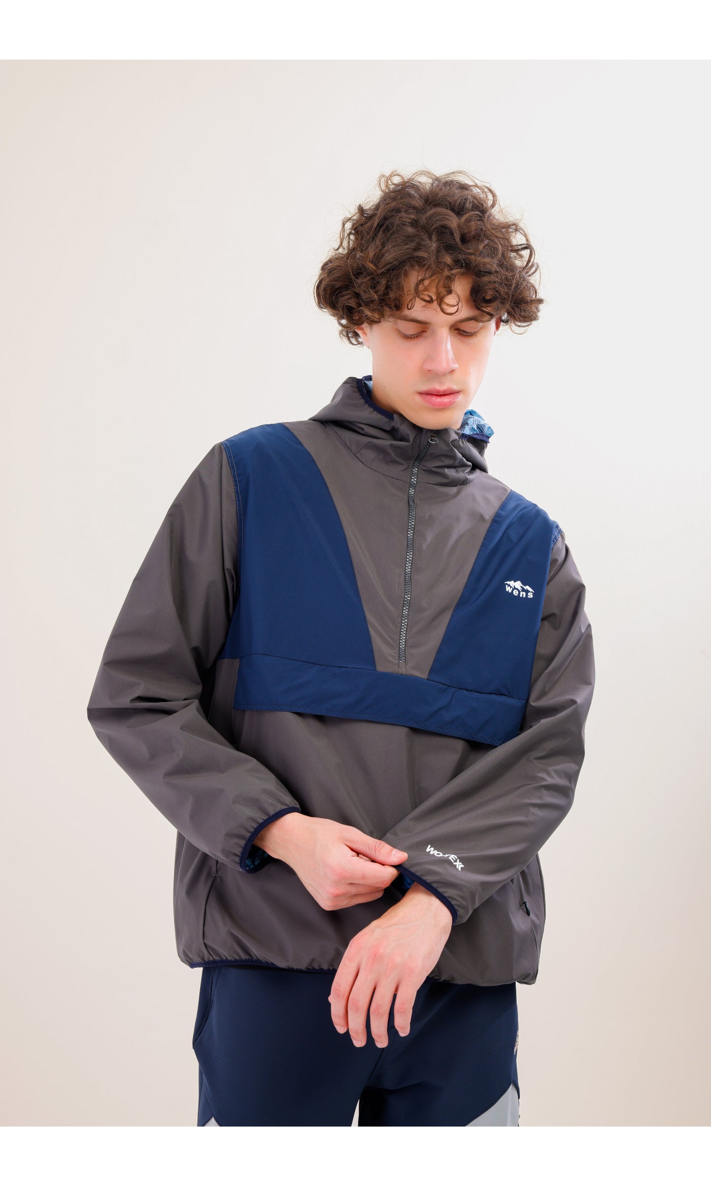 Flow Flex Ultralight Waterproof Hoodie – Gray / Navy Blue (Deep Horizons), Design That Turns Into a Bag