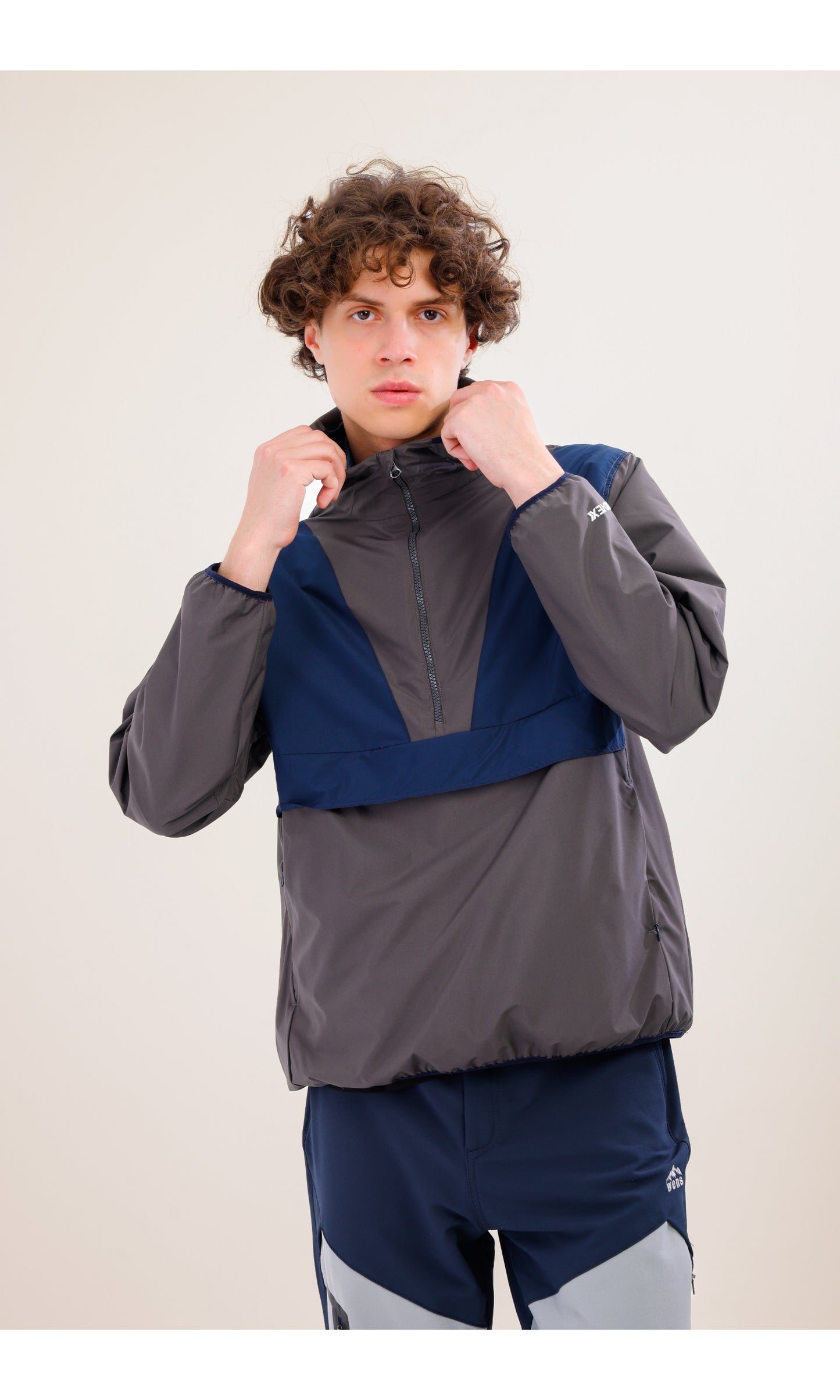 Flow Flex Ultralight Waterproof Hoodie – Gray / Navy Blue (Deep Horizons), Design That Turns Into a Bag