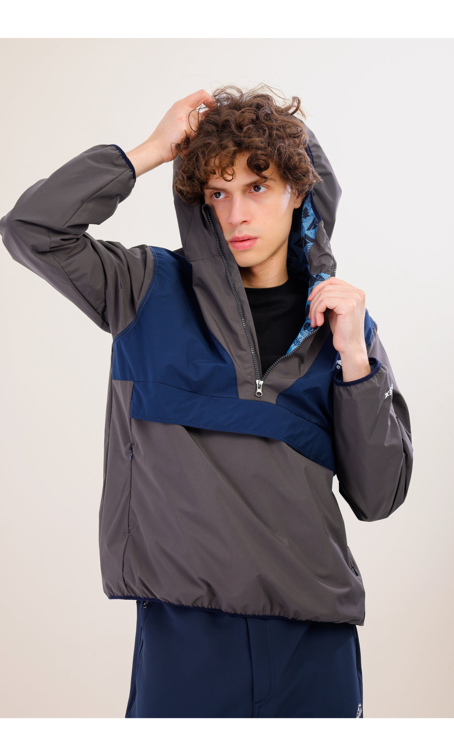 Flow Flex Ultralight Waterproof Hoodie – Gray / Navy Blue (Deep Horizons), Design That Turns Into a Bag